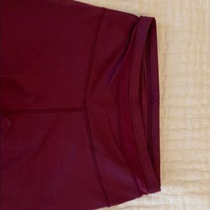 Maroon fabletics legging with mesh trim